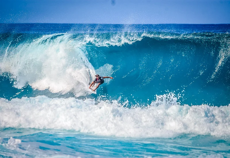 Person surfing in the ocean